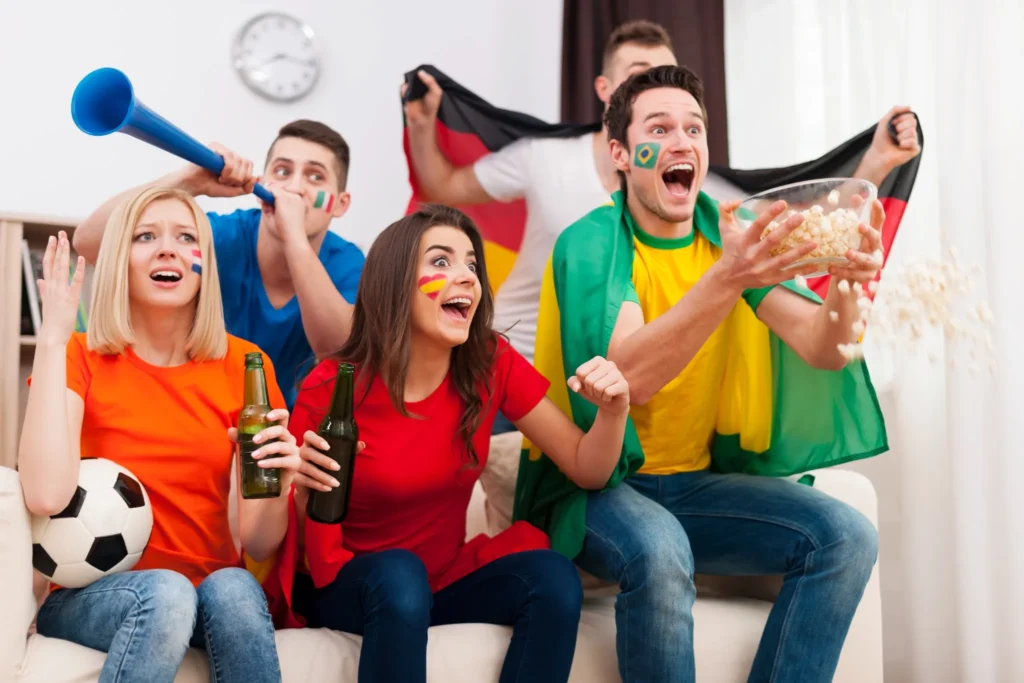 Supporters de football enthousiastes regardant un match en direct – À propos de IPTV Quebec